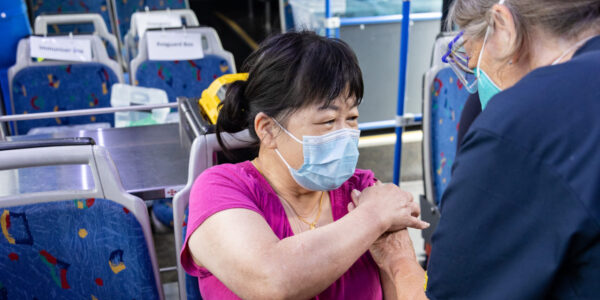 Pictured: Sow Chau See, Patient and Jill Sullivan, Registered Nurse. Ministerial Visit to SEPHU Vaccination Bus parked at Monash Civic Centre. Copyright Monash Health. Not for use without prior written permission.