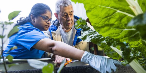 Pictured (L-R): Hilda John Jeyapalan, Occupational Therapist, Robert Burns (patient).Copyright Monash Health. Not for use without prior written permission.